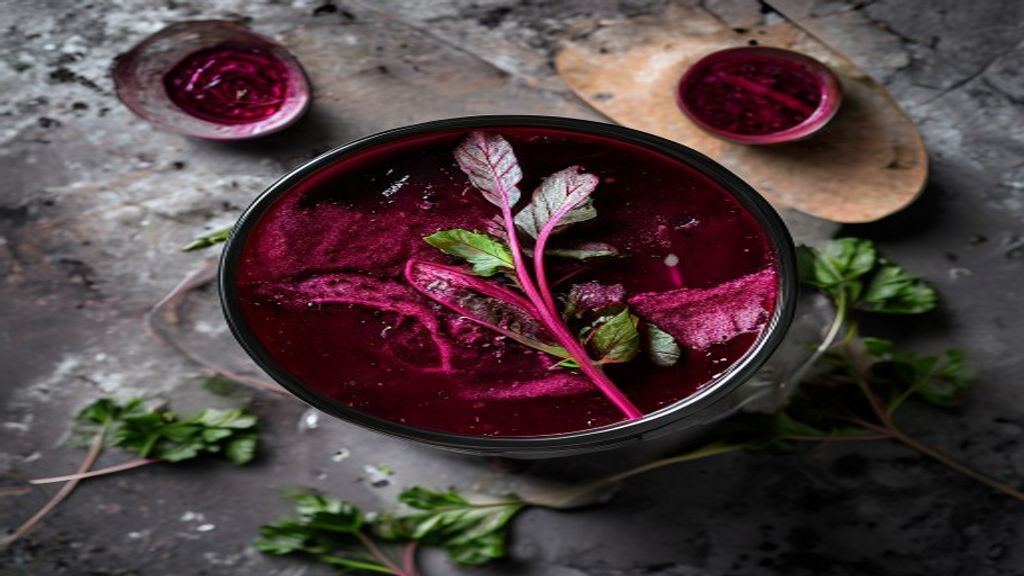 Vibrant Beetroot Juice Top down view of a glass filled with fresh beet and apple juice.