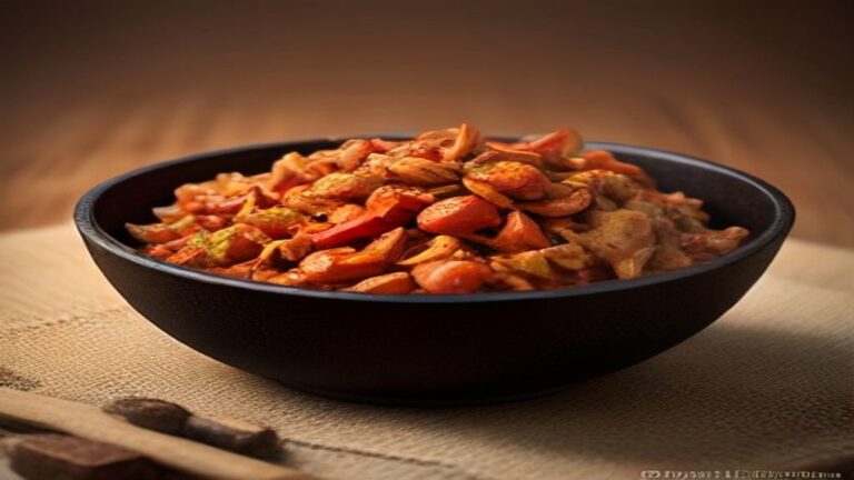 A bowl of vibrant homemade jerk seasoning paste made with fresh scotch bonnet peppers and aromatics.